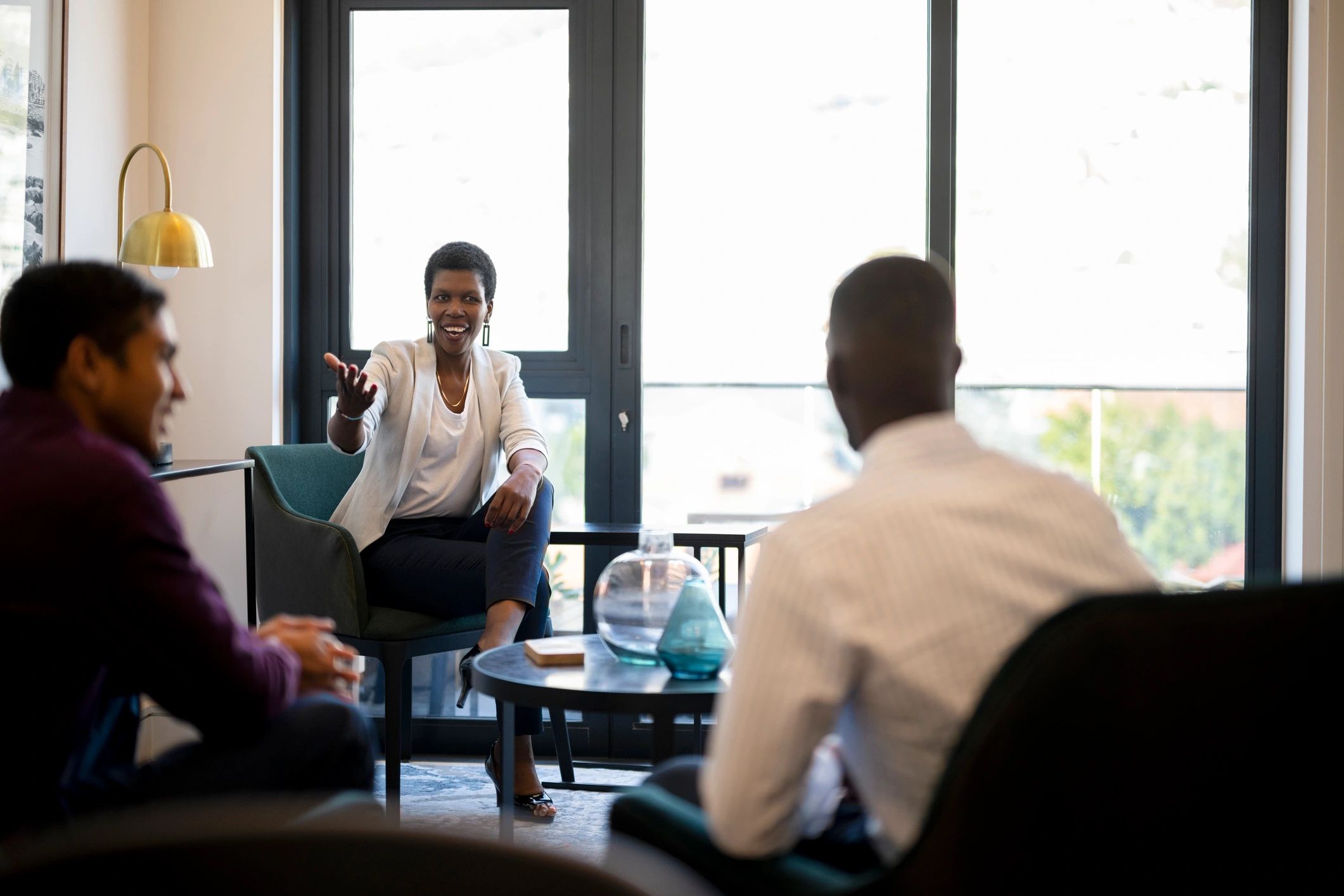 African businesswoman leading a professional team meeting