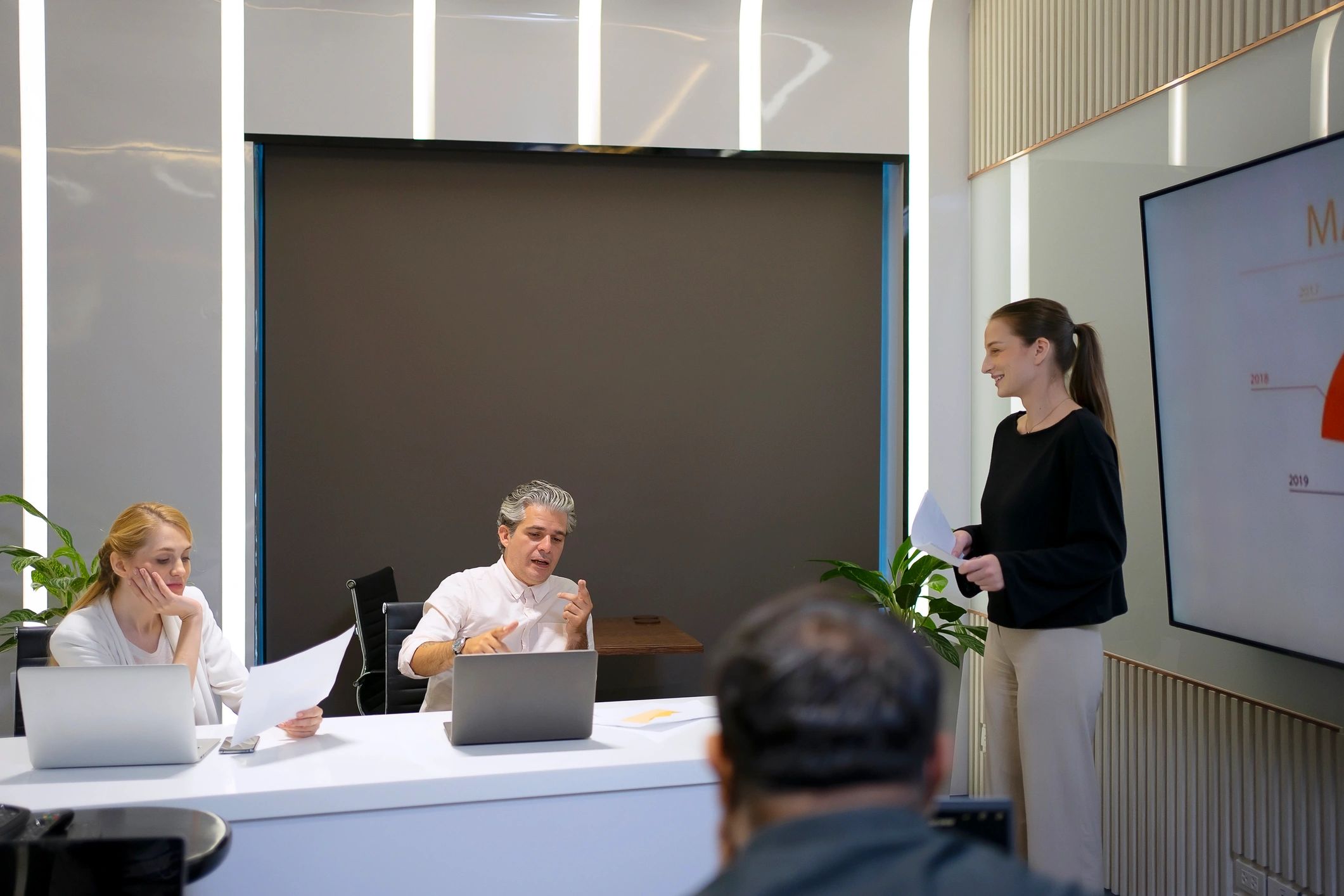 Business buyers meeting to discuss sourcing requirements