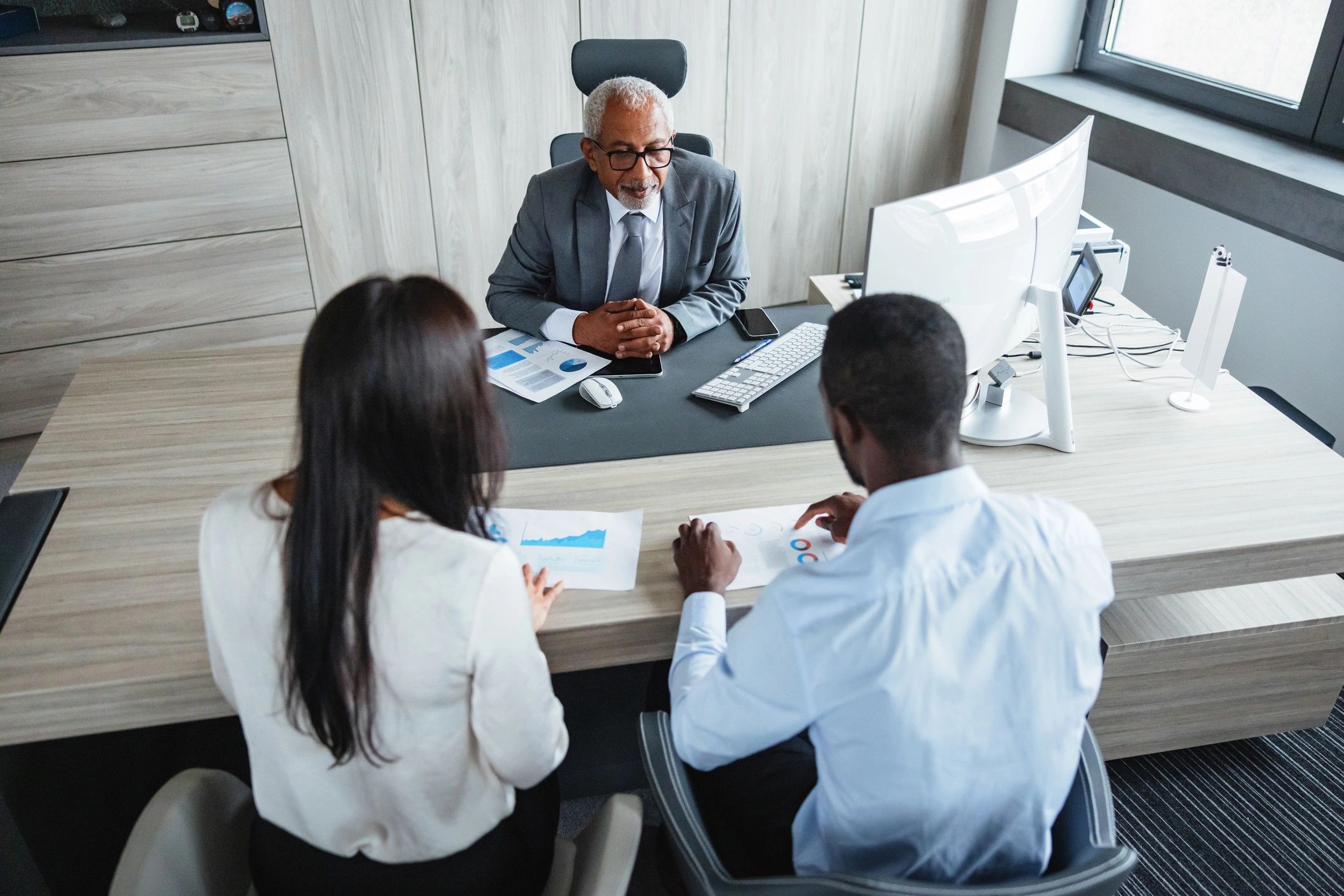 Business team discussing marketplace account responsibilities